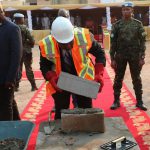 pose de la première pièrre de la construction du niveau siège de la CBCA